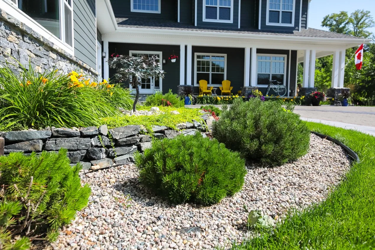 Decorative gravel installed in a Winnipeg front garden